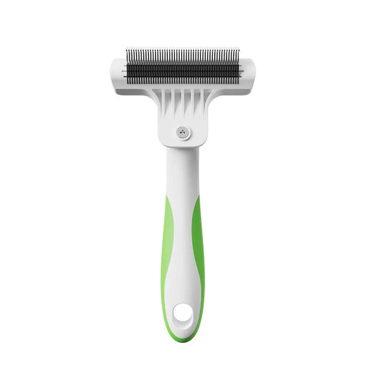 Pet grooming brush with green handle on a white background